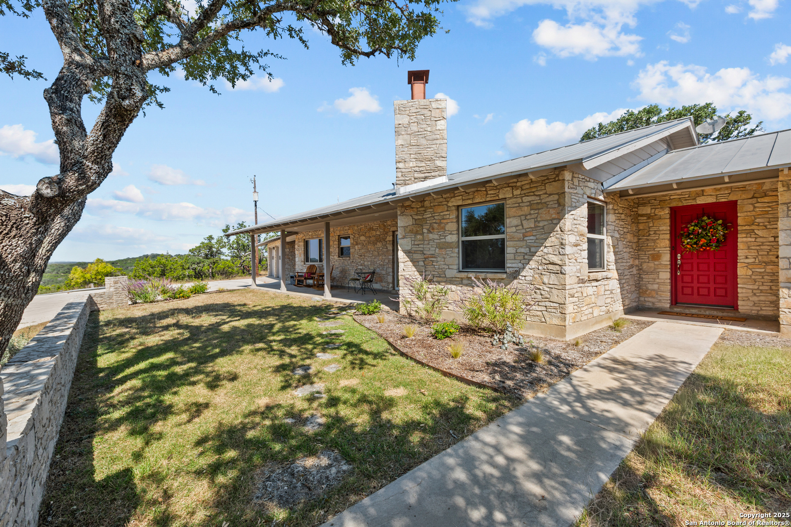 935 Spring Branch Road Spring Branch, TX 78070 - Photo 45 of 48 a view of a house with backyard