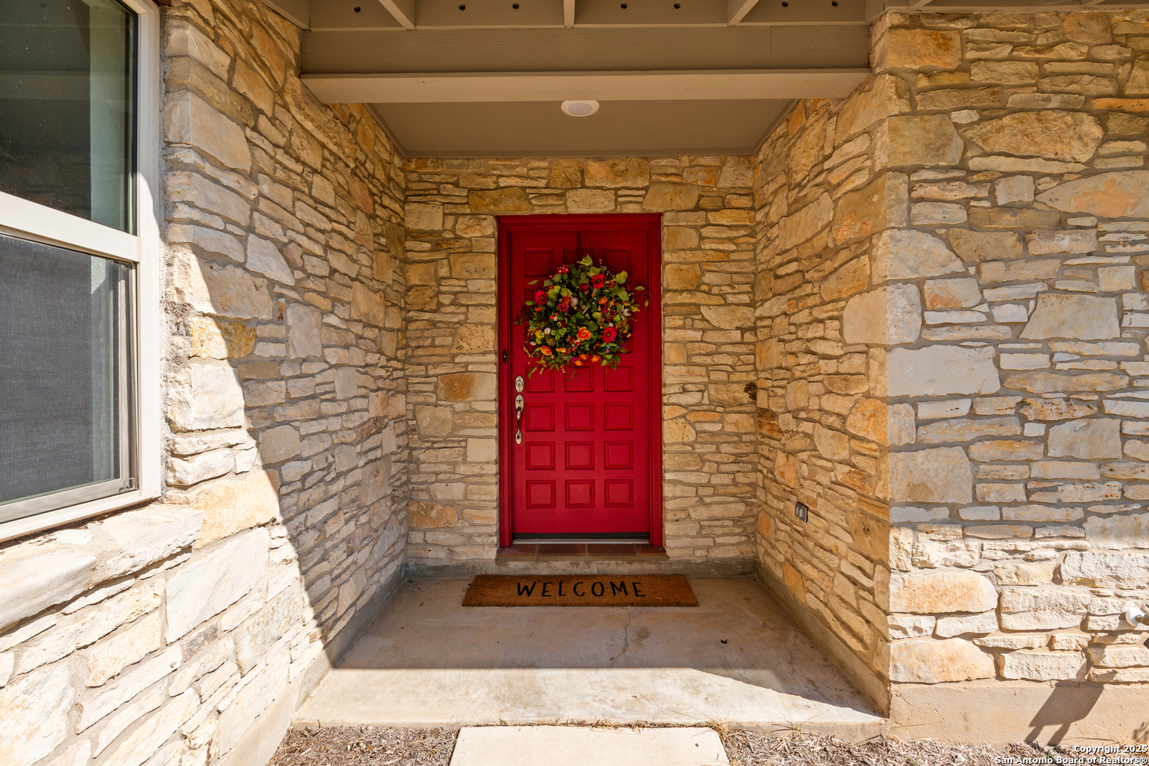 935 Spring Branch Road Spring Branch, TX 78070 - Photo 47 of 48 a building with a red door