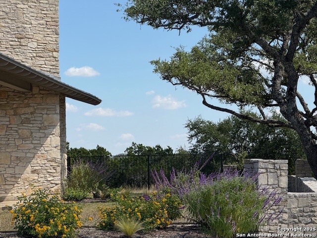 935 Spring Branch Road Spring Branch, TX 78070 - Photo 5 of 48 a backyard of a house with lots of green space