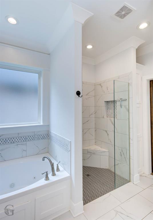 605 Meridian Way Benton, LA 71006 - Photo 25 of 29 Spa-like bathroom featuring a built-in jetted tub with brushed nickel fixtures