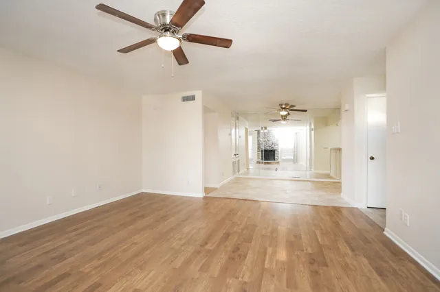 a view of an empty room and window