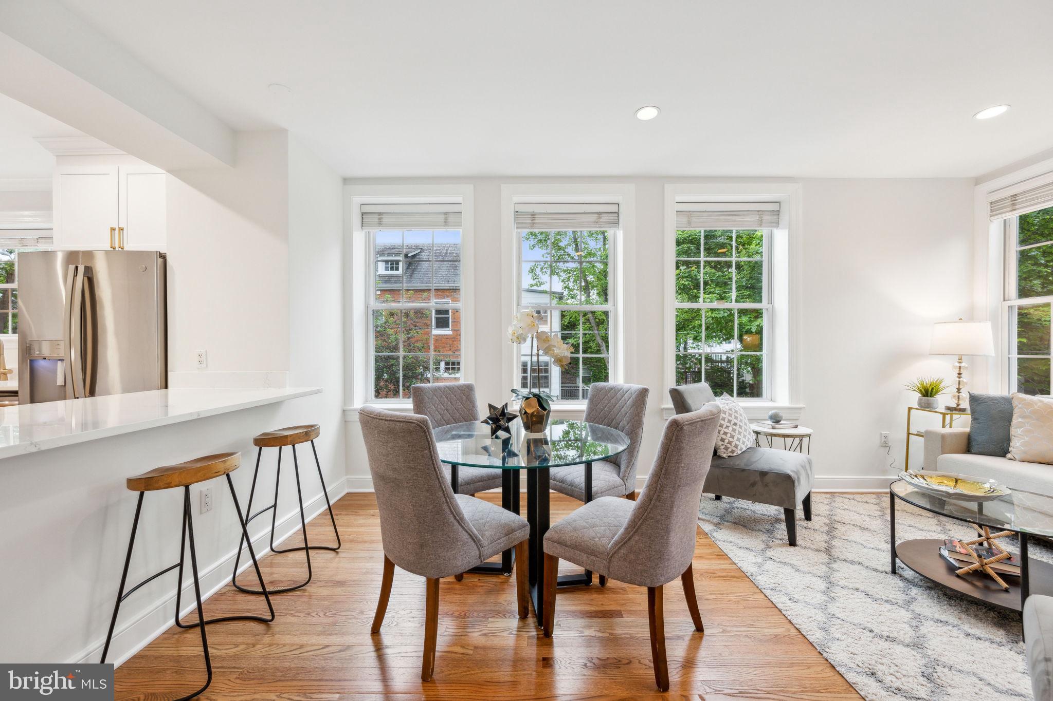 2444 Tunlaw Road Northwest Washington, DC 20007 - Photo 12 of 38 a view of a dining room with furniture window and outside view