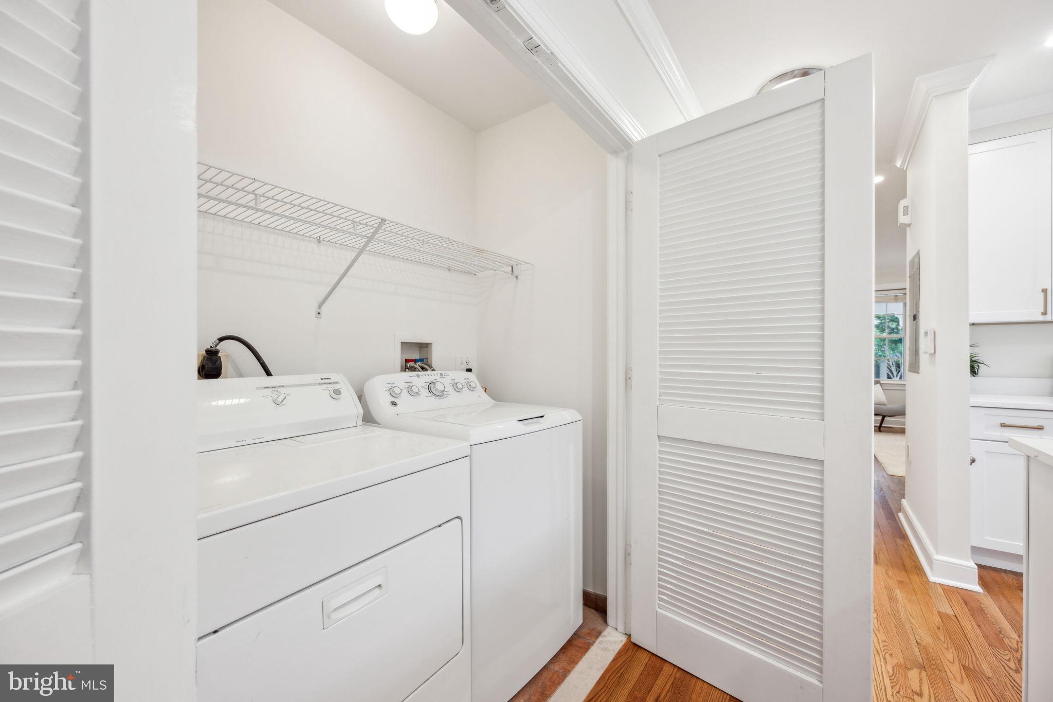 2444 Tunlaw Road Northwest Washington, DC 20007 - Photo 14 of 38 a utility room with dryer and washer