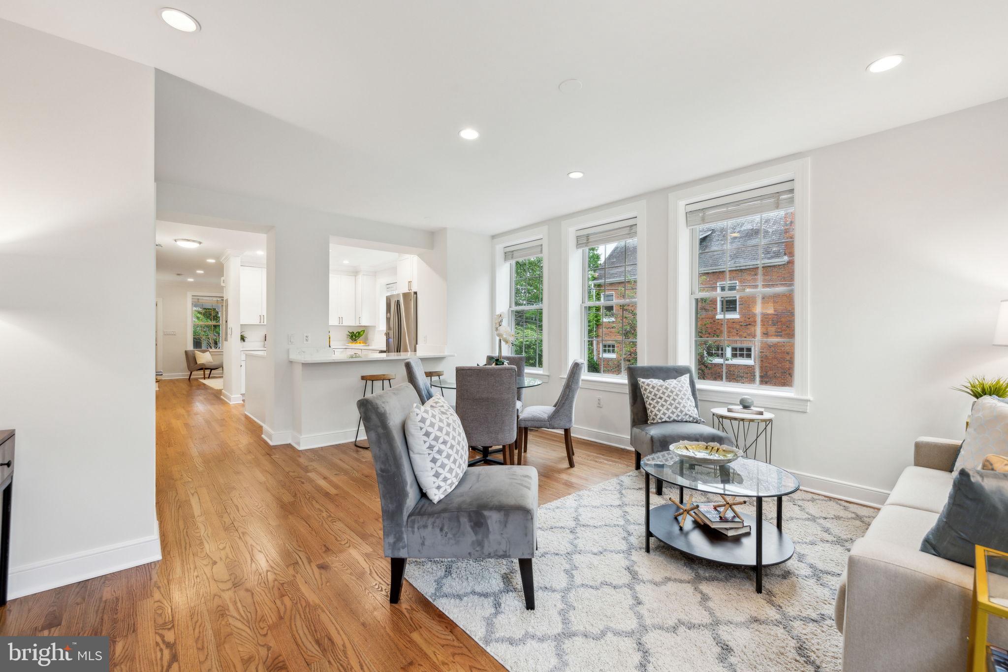 2444 Tunlaw Road Northwest Washington, DC 20007 - Photo 9 of 38 a living room with furniture and a large window