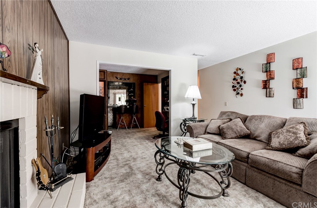 6250 Hillside Avenue Riverside, CA 92504 - Photo 15 of 32 living room open to office and bar