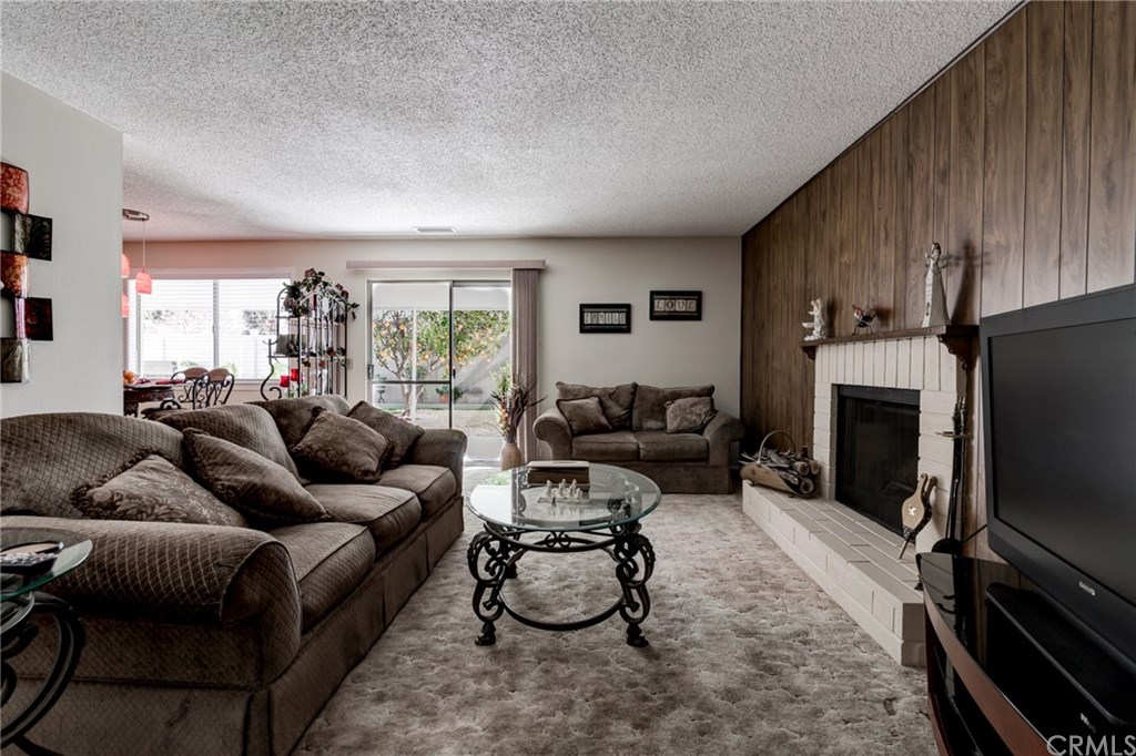 6250 Hillside Avenue Riverside, CA 92504 - Photo 16 of 32 living room, sliding glass doors which open to covered patio