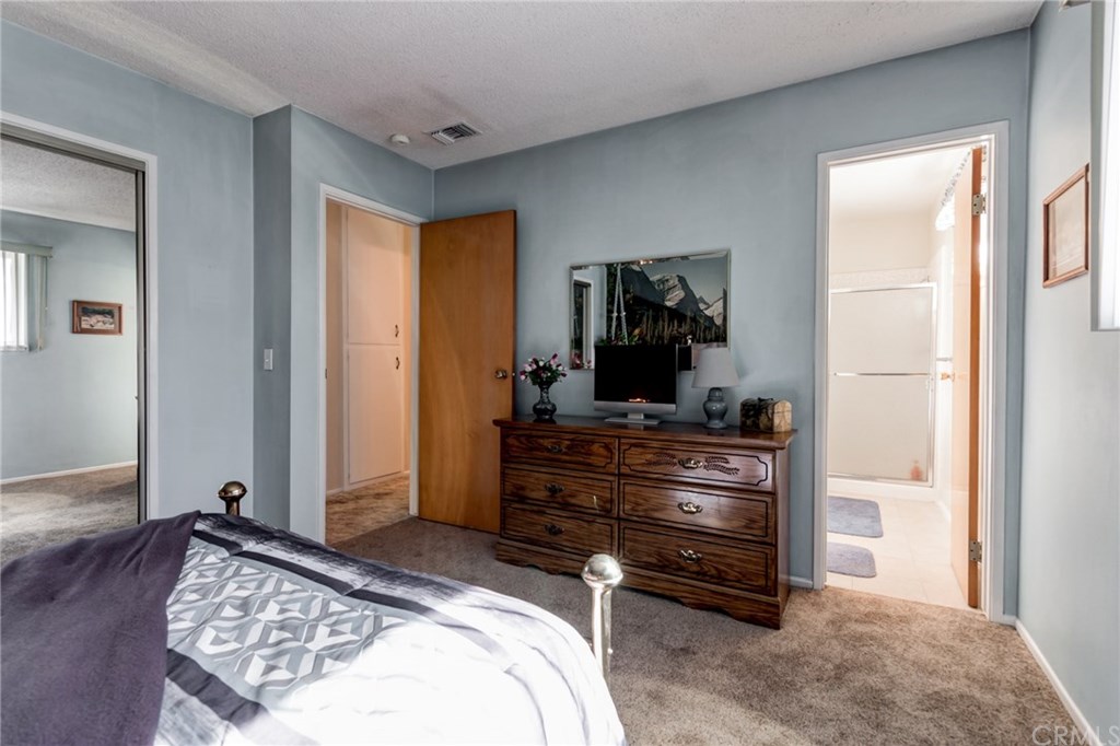 6250 Hillside Avenue Riverside, CA 92504 - Photo 22 of 32 master bedroom with mirrored doors