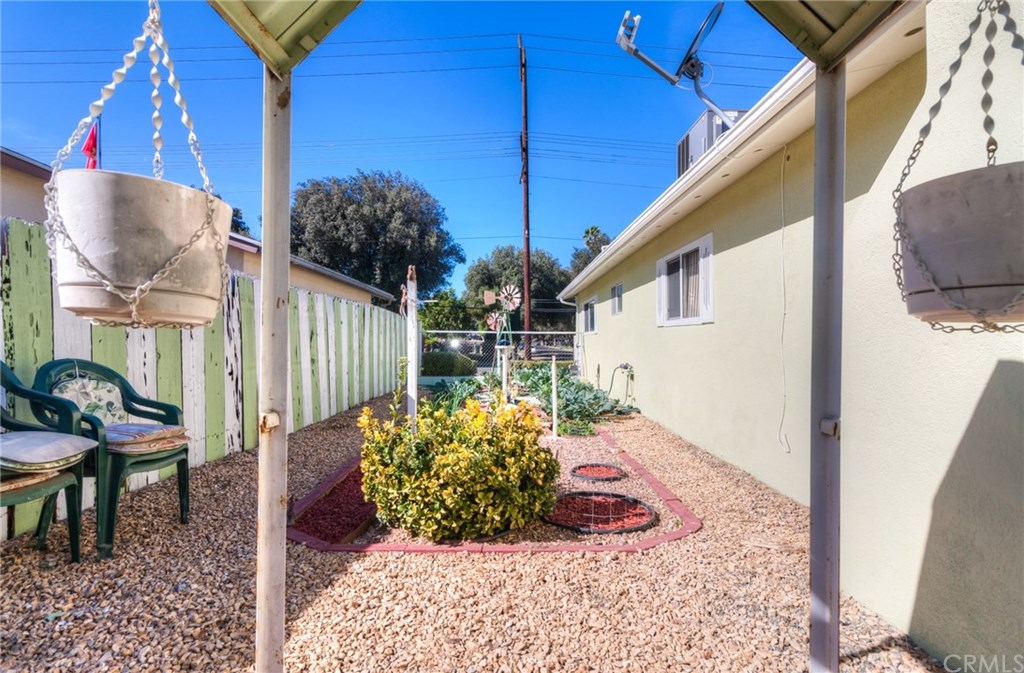 6250 Hillside Avenue Riverside, CA 92504 - Photo 27 of 32 side yard with vegetable garden