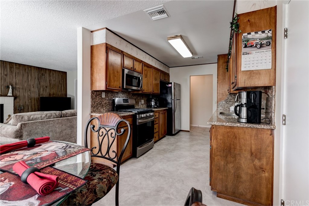 6250 Hillside Avenue Riverside, CA 92504 - Photo 8 of 32 another view of the kitchen from the nook area