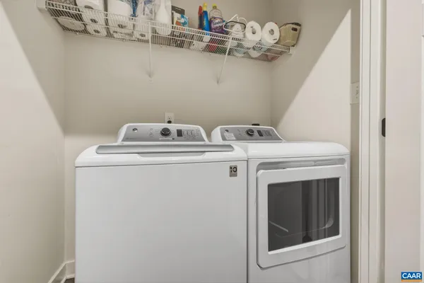 a view of swimming pool with a lake view