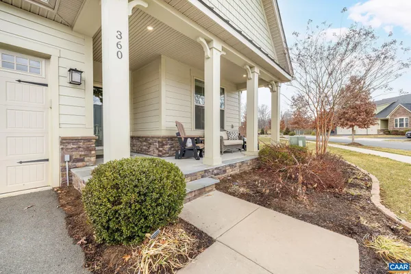 a view of a backyard of the house