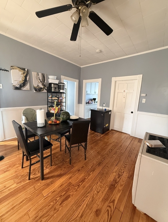 40 Park Street Fall River, MA 02721 - Photo 2 of 4 a view of a dining room with furniture and wooden floor