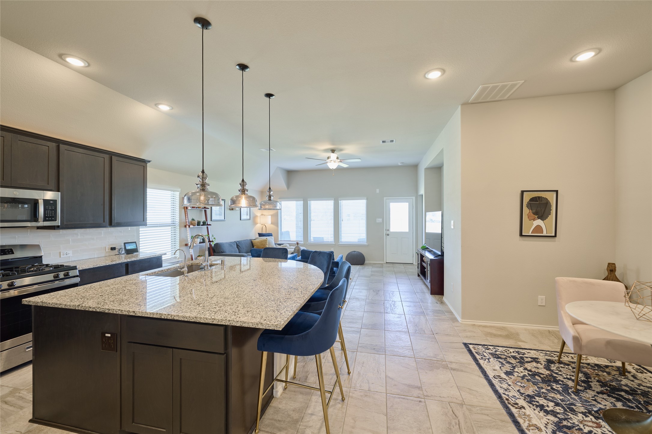 4523 Stone Ridge Lane Manvel, TX 77578 - Photo 44 of 44 This home open floorplan is great for the family.