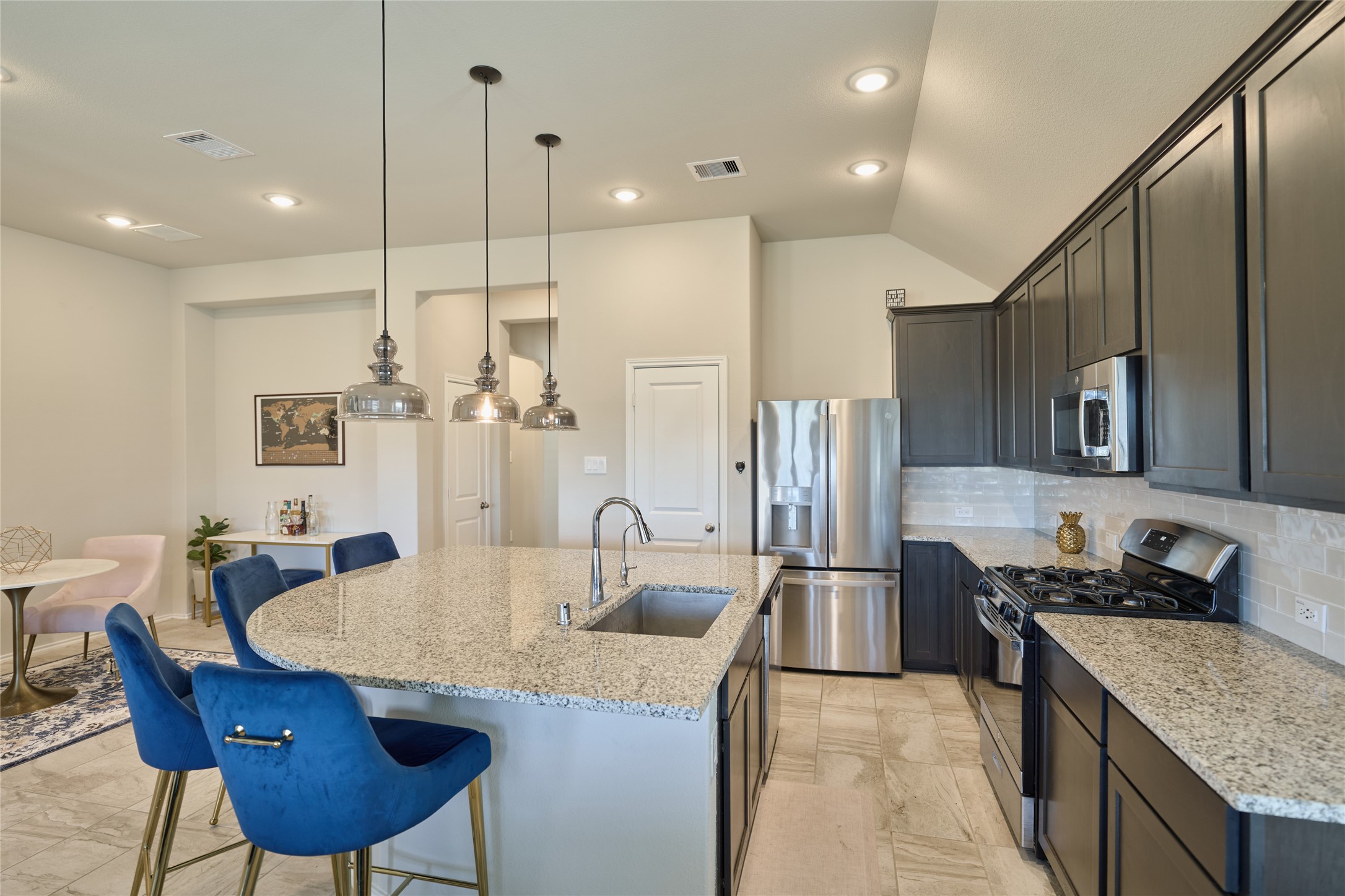 4523 Stone Ridge Lane Manvel, TX 77578 - Photo 16 of 44 You will enjoy the granite countertops, stainless steel appliances and large kitchen sink.