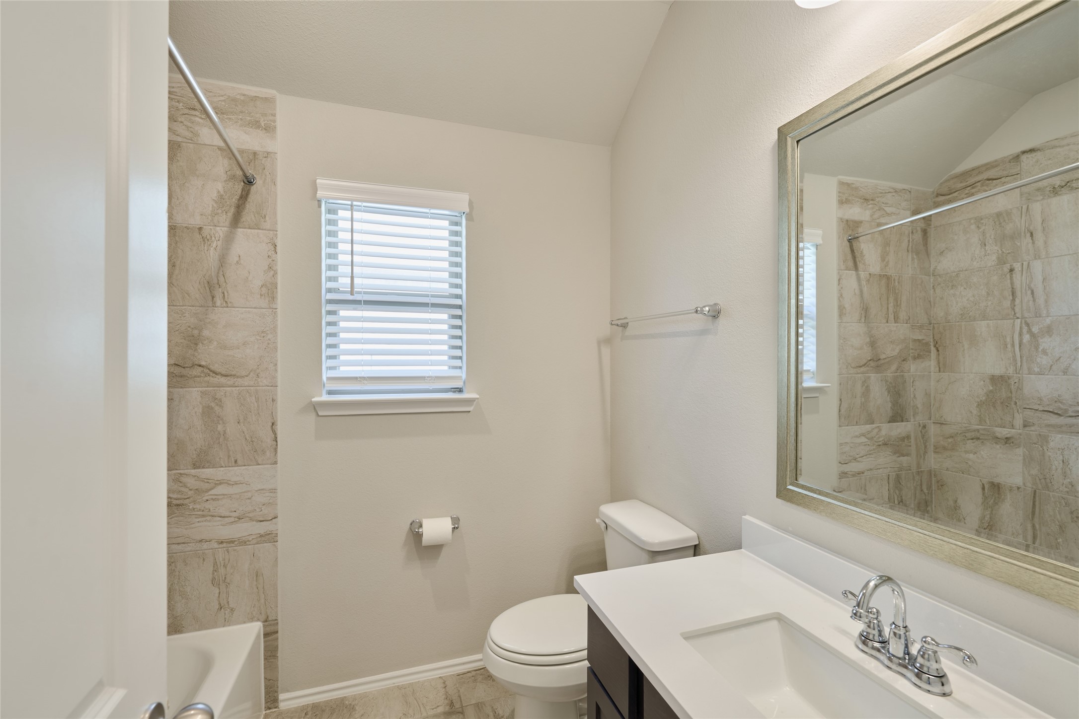 4523 Stone Ridge Lane Manvel, TX 77578 - Photo 8 of 44 Next to the first bedroom is the guest bathroom