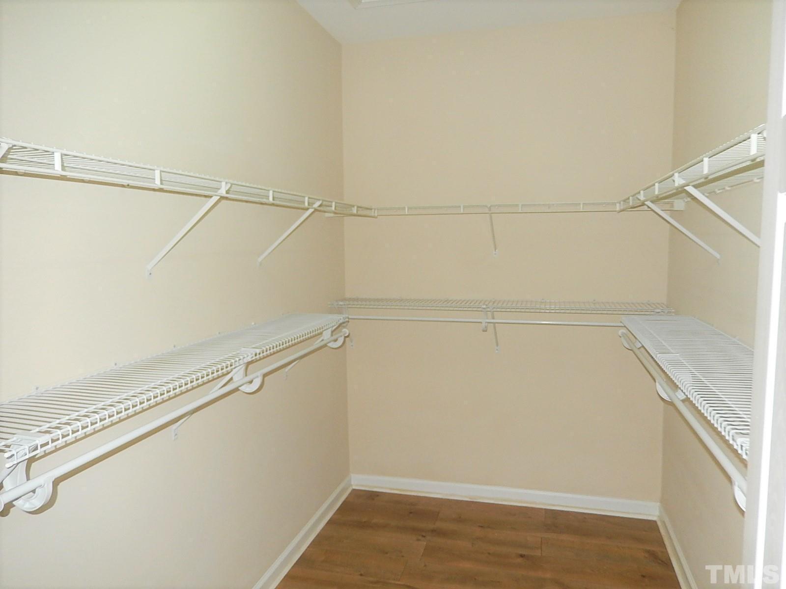 4717 Delta Ridge Court Raleigh, NC 27612 - Photo 13 of 30 a view of a room with racks on the wall