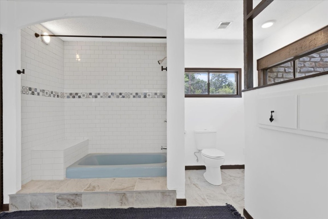 502 Grace Lane Austin, TX 78746 - Photo 17 of 37 a bathroom with a shower