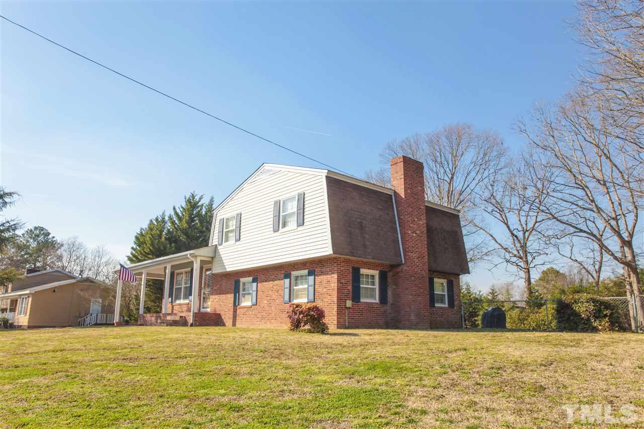 4105 Willow Oak Road Raleigh, NC 27604 - Photo 3 of 8 a view of a house with a yard