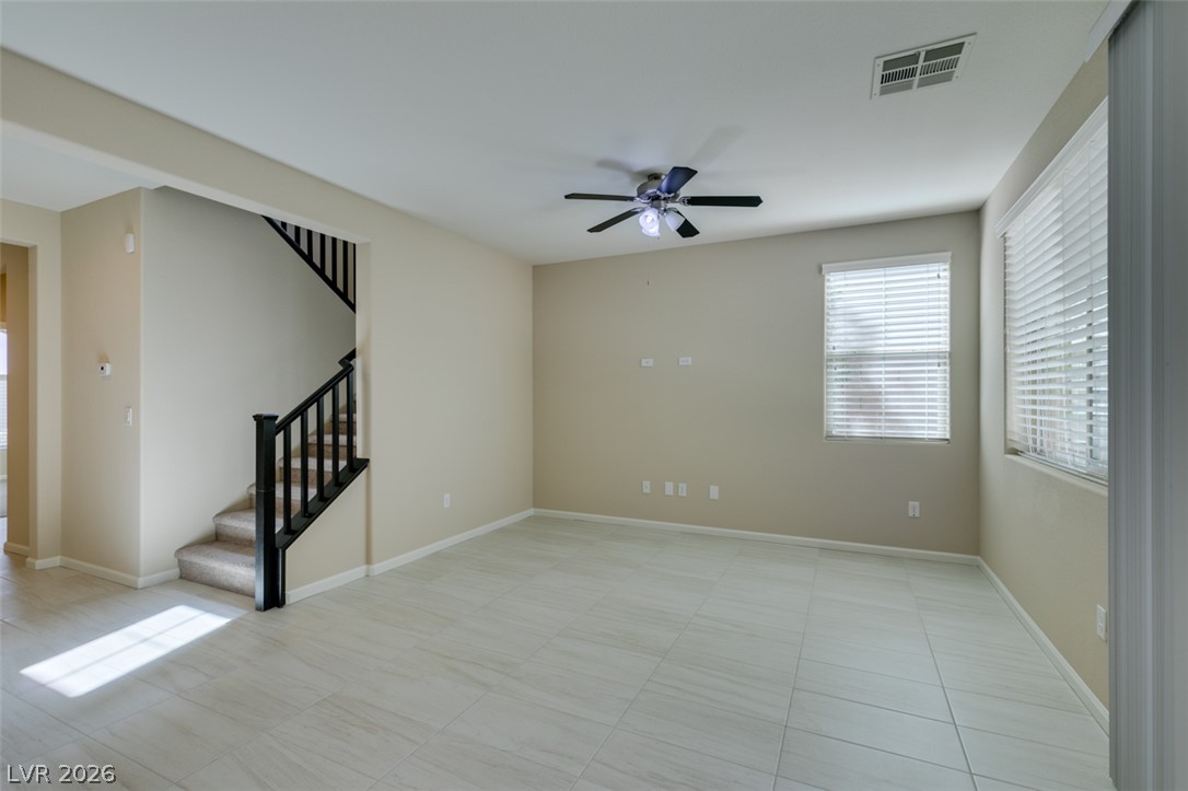 2549 Sable Ridge Street Henderson, NV 89044 - Photo 13 of 48 A spacious common area with contemporary tiled floors and ample natural illumination.