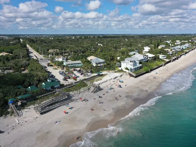 a view of a city with an ocean view