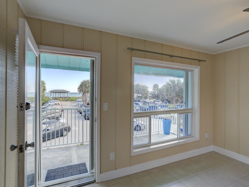 1840 Wabasso Beach Road Vero Beach, FL 32963 - Photo 4 of 22 an empty room with wooden floor and a window
