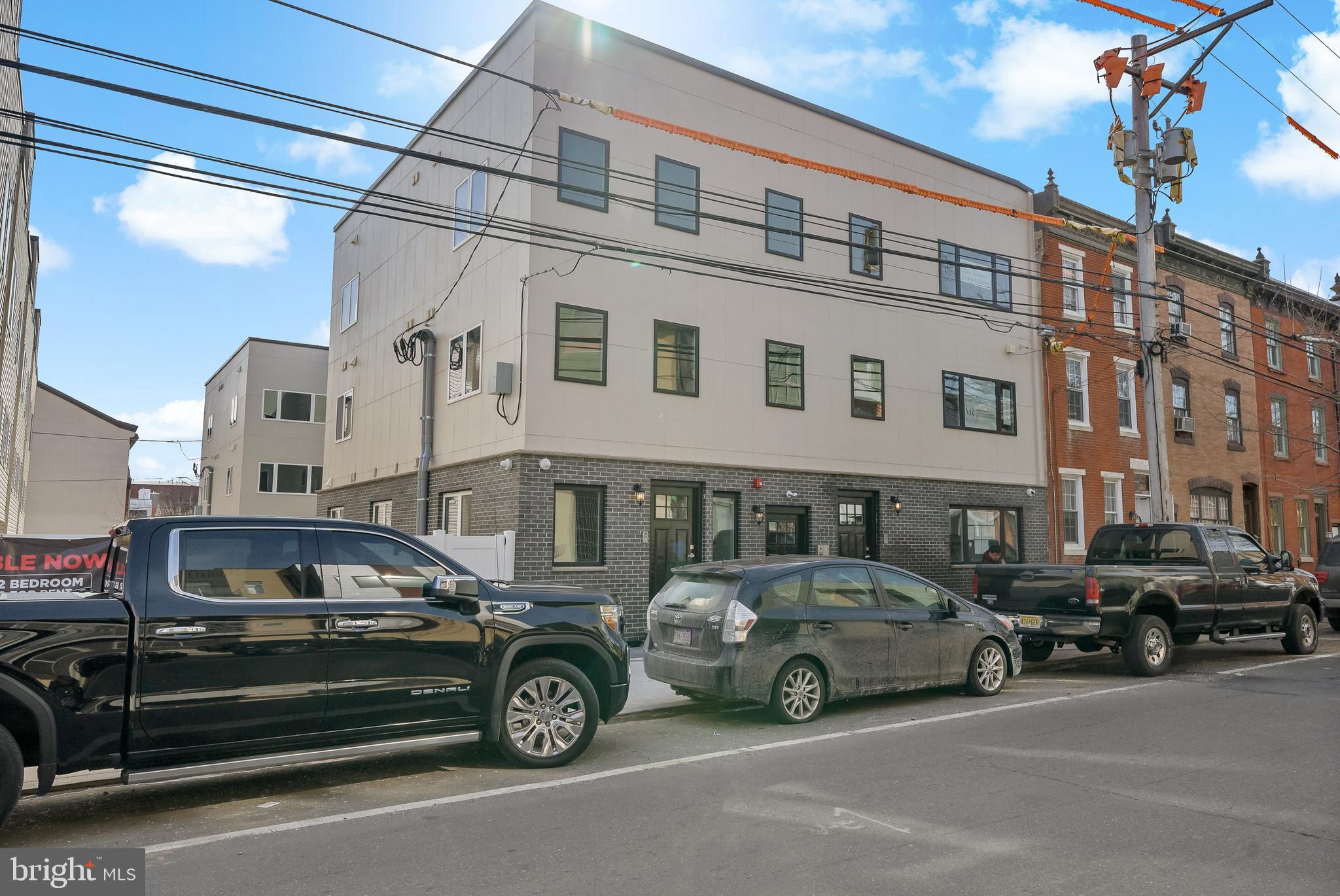 1530 Palethorp Street, Unit 2B Philadelphia, PA 19122 - Photo 14 of 15 a car parked in front of a building