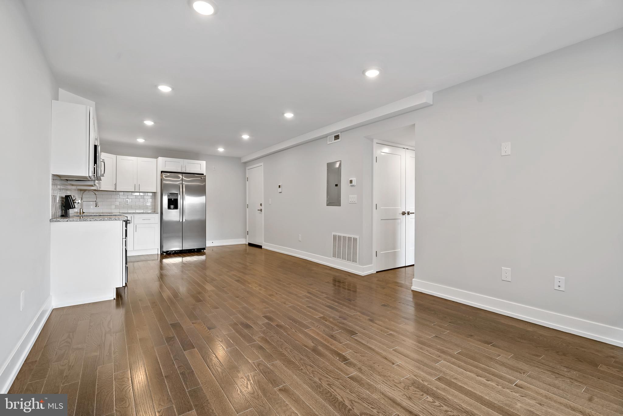 1530 Palethorp Street, Unit 2B Philadelphia, PA 19122 - Photo 3 of 15 a view of kitchen with wooden floor