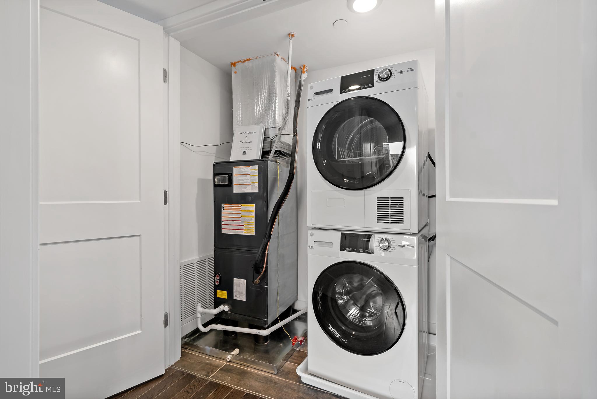 1530 Palethorp Street, Unit 2B Philadelphia, PA 19122 - Photo 5 of 15 a utility room with sink dryer and washer