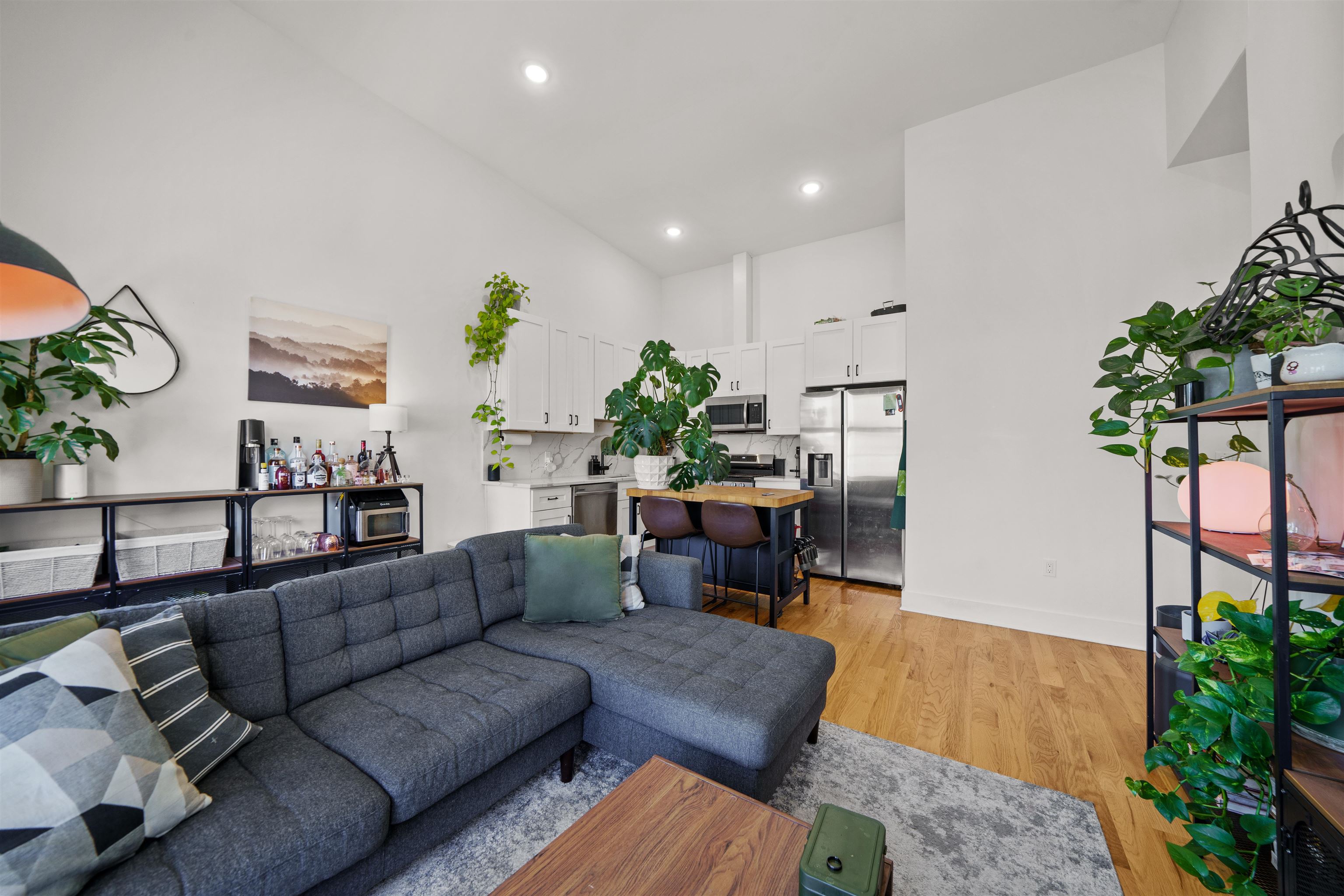 34 Van Reypen Street, Unit 2 Jersey City, NJ 07306 - Photo 8 of 25 a living room with furniture