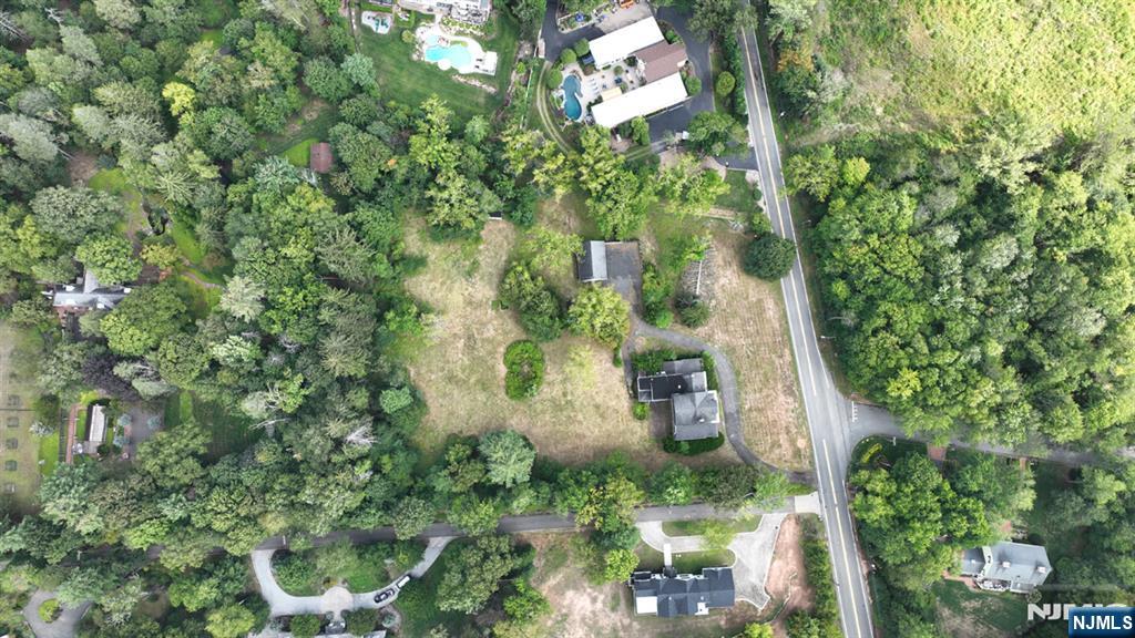 235 Wearimus Road Ho-Ho-Kus, NJ 07423 - Photo 5 of 12 an aerial view of a house with yard