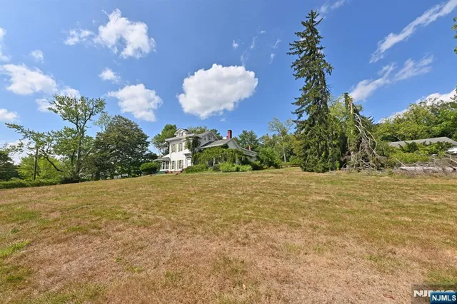 a view of a backyard of a house