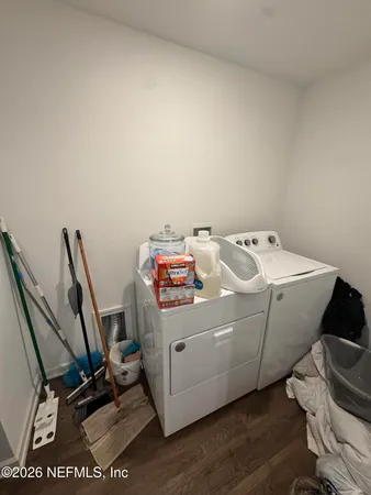 a utility room with dryer and washer