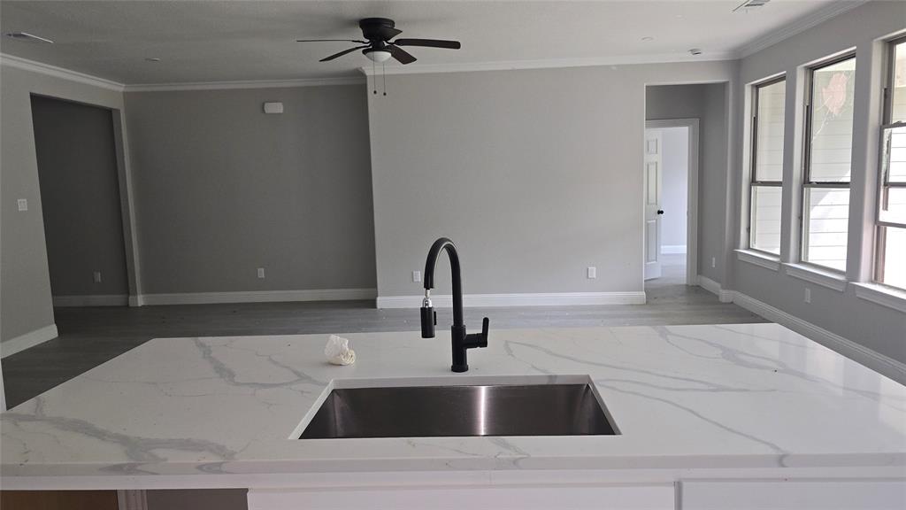 228 East Acres Road Gun Barrel City, TX 75156 - Photo 17 of 25 a kitchen with a sink and a window