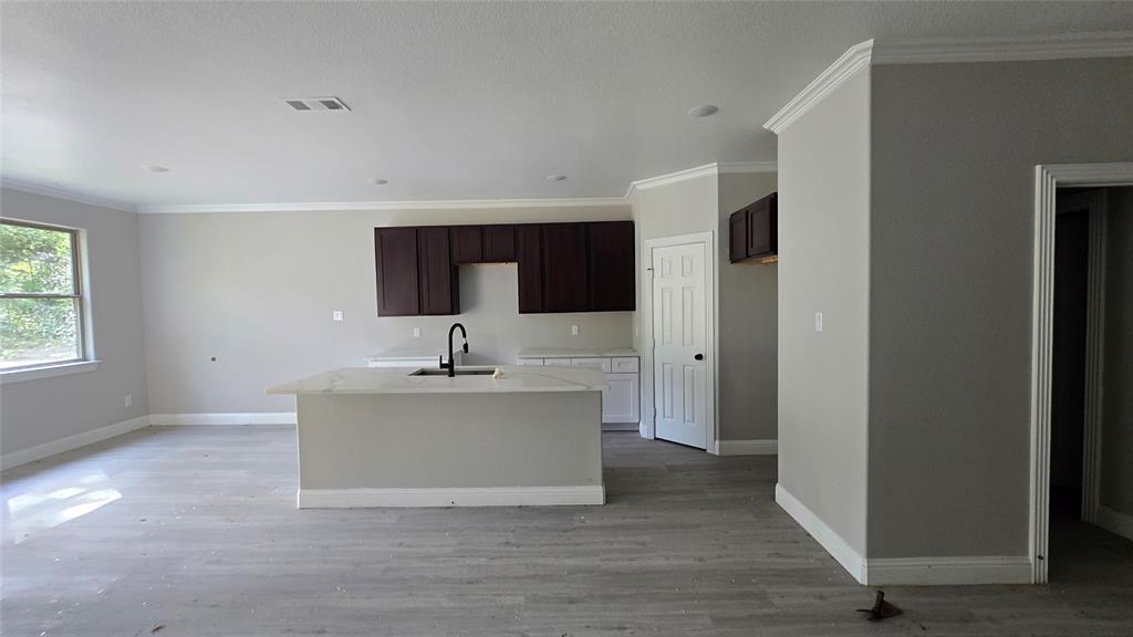 228 East Acres Road Gun Barrel City, TX 75156 - Photo 20 of 25 a view of a kitchen with a sink and a large window