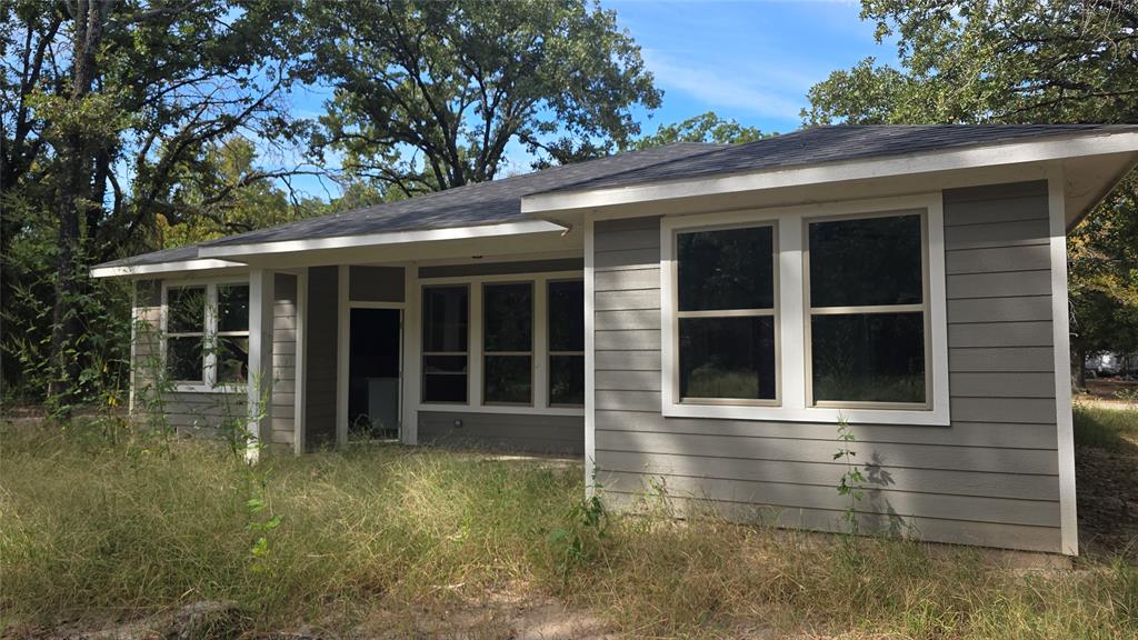 228 East Acres Road Gun Barrel City, TX 75156 - Photo 21 of 25 front view of a house with a window