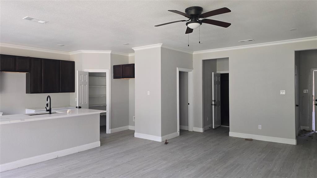 228 East Acres Road Gun Barrel City, TX 75156 - Photo 4 of 25 a view of a livingroom with a kitchen
