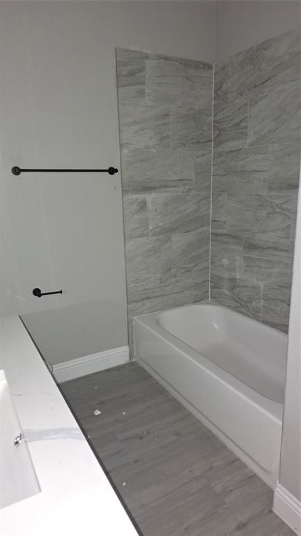 228 East Acres Road Gun Barrel City, TX 75156 - Photo 8 of 25 a bathroom with a bathtub