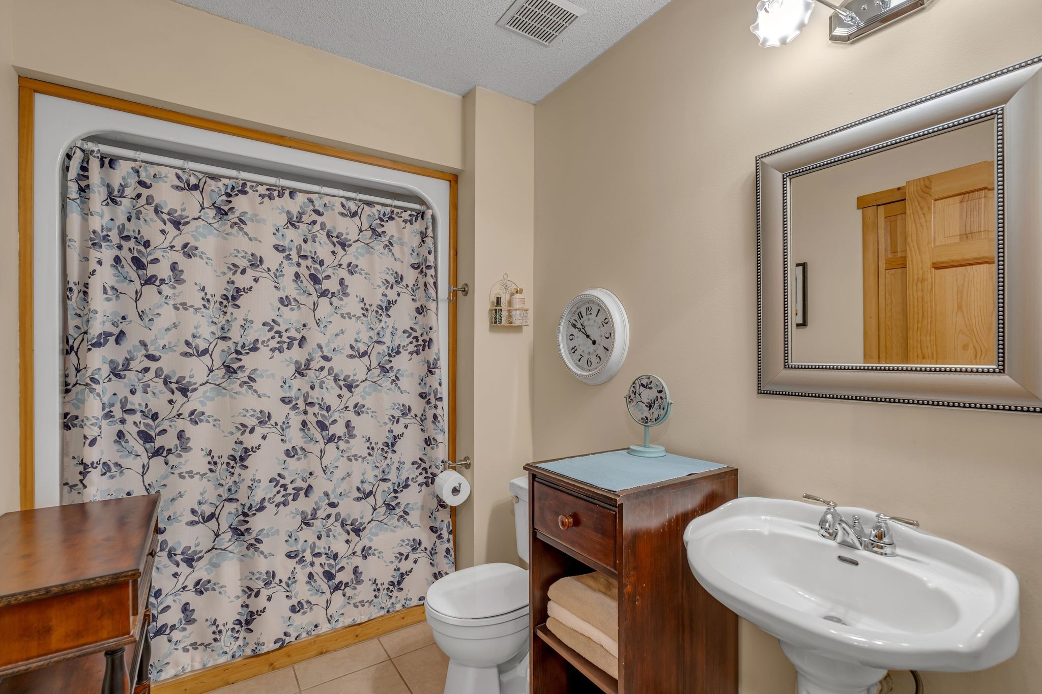 3 Copperas Branch Road Leoma, TN 38468 - Photo 14 of 25 a bathroom with a sink toilet and mirror