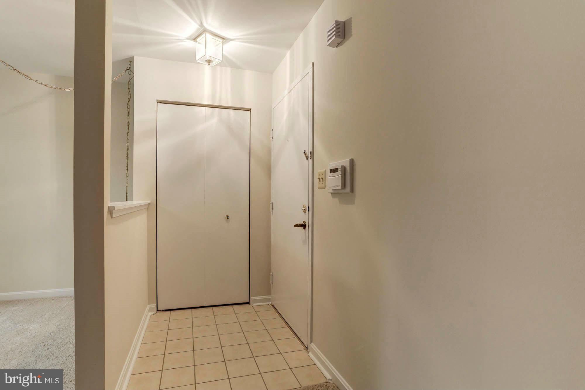 4906 Columbia Road, Unit 1 Columbia, MD 21044 - Photo 4 of 21 Foyer & Coat Closet