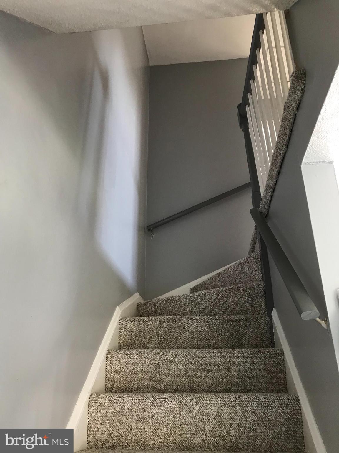 7712 Charlesmont Road Dundalk, MD 21222 - Photo 15 of 35 Staircase Upstairs