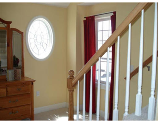 126 Smith Street, Unit 1 Lowell, MA 01851 - Photo 15 of 19 a view of entryway with wooden floor