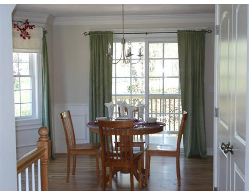 126 Smith Street, Unit 1 Lowell, MA 01851 - Photo 5 of 19 a view of a dining room with furniture window and outside view