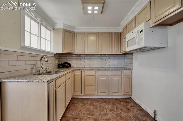 a view of a sink and window