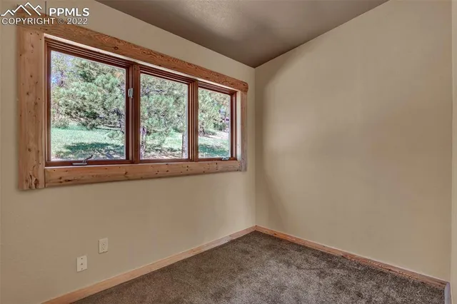 a picture of a room with a white wall and has white walls