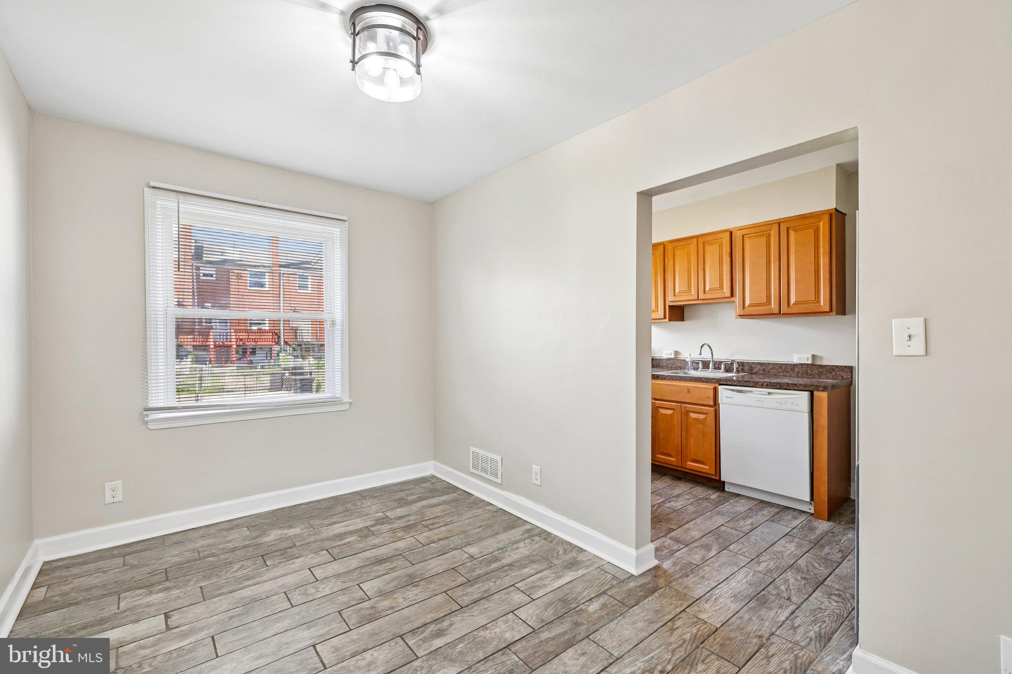 335 Torner Road Baltimore, MD 21221 - Photo 7 of 25 Bright and airy kitchen entryway.