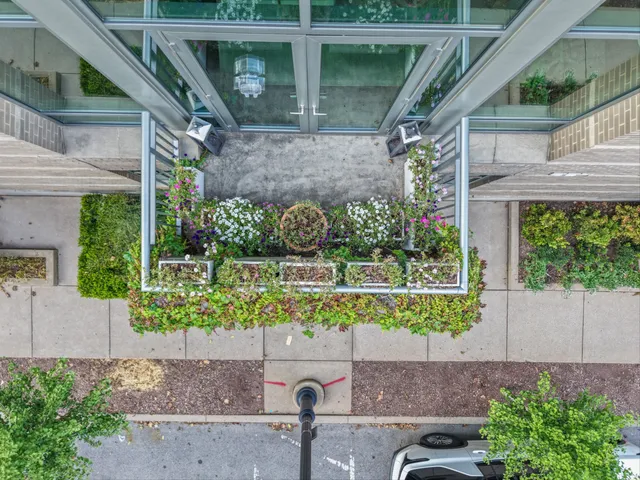 a view of a building with a garden