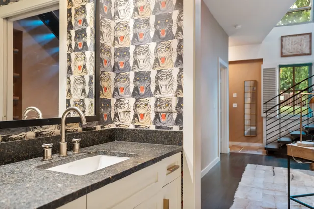 a bedroom with a bed and a couch