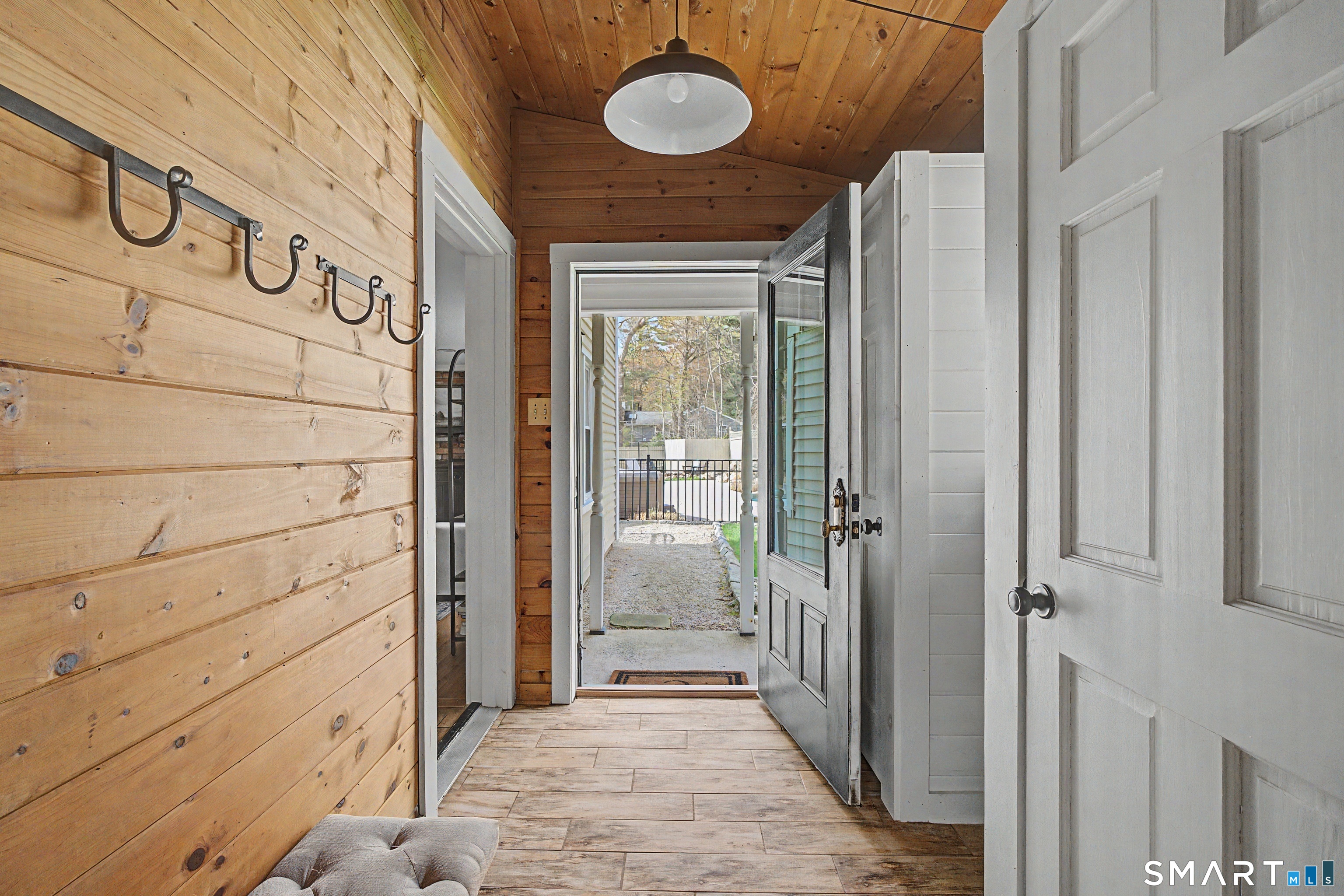 602 Durham Road Madison, CT 06443 - Photo 16 of 34 Mudroom with tile flooring & separate entrance offers built in's and added closet space