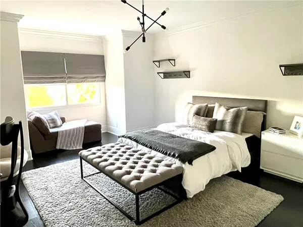 a bedroom with furniture