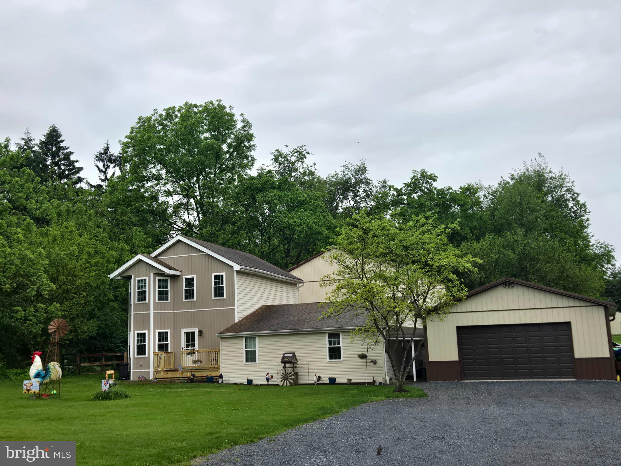 1669 Colebrook Road Lebanon, PA 17042 - Photo 2 of 34 a front view of a house with a yard